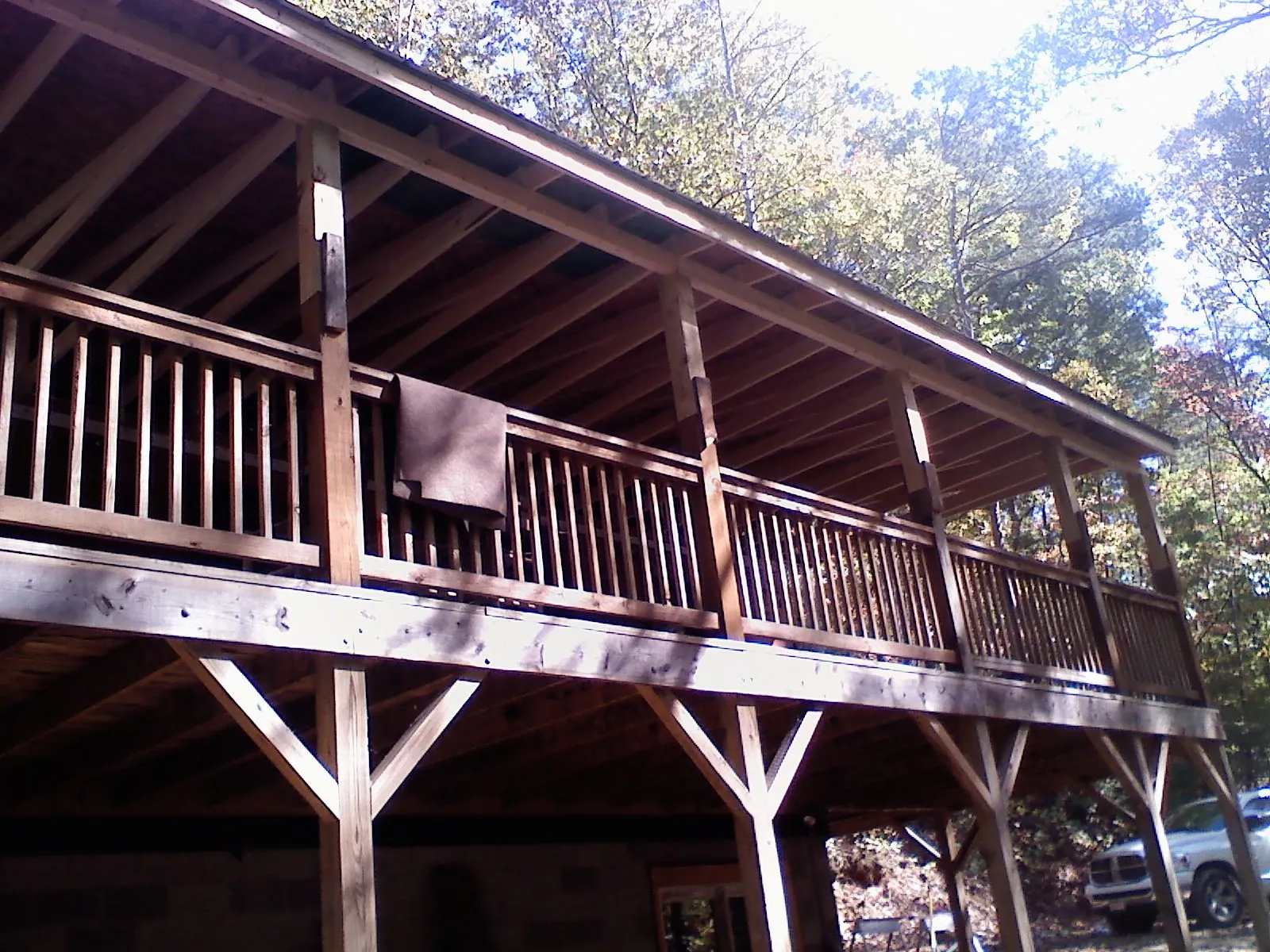 Timber framing under a new elevated porch and deck — Roof Leak Repair in Hunker by Roofing Brothers